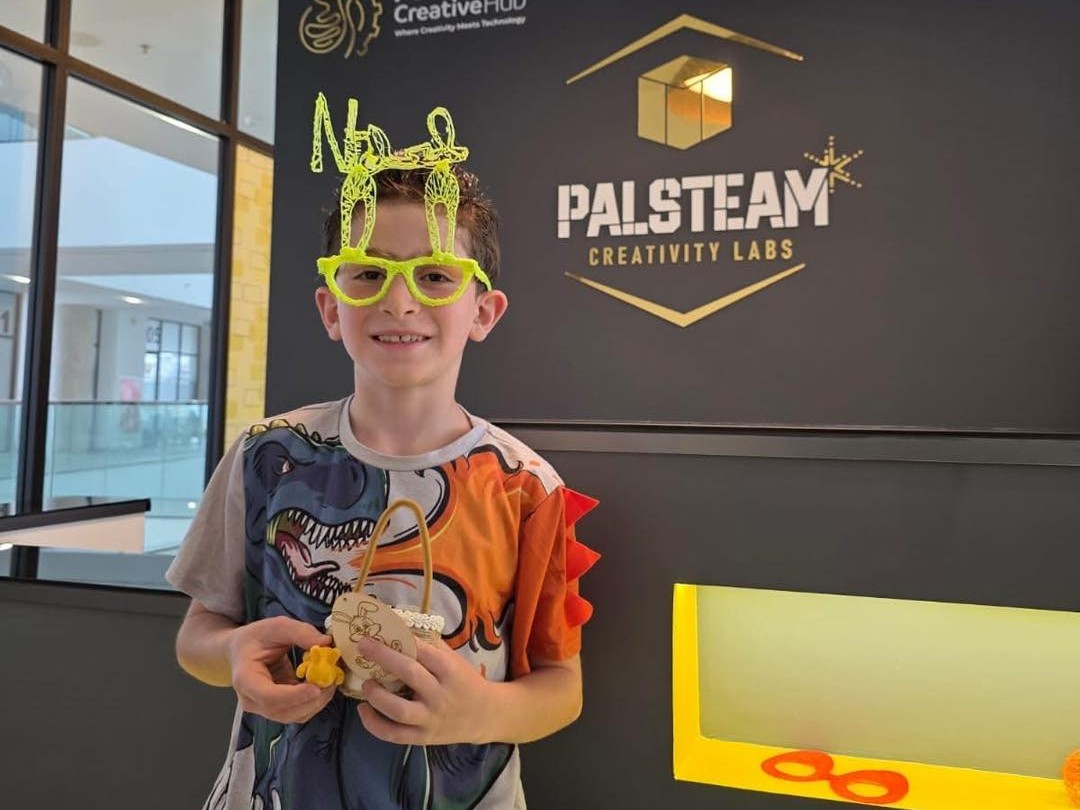 A child at a creativity lab workshop in the building
