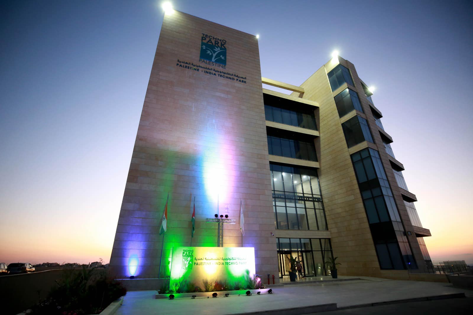 The main building lit up after dark