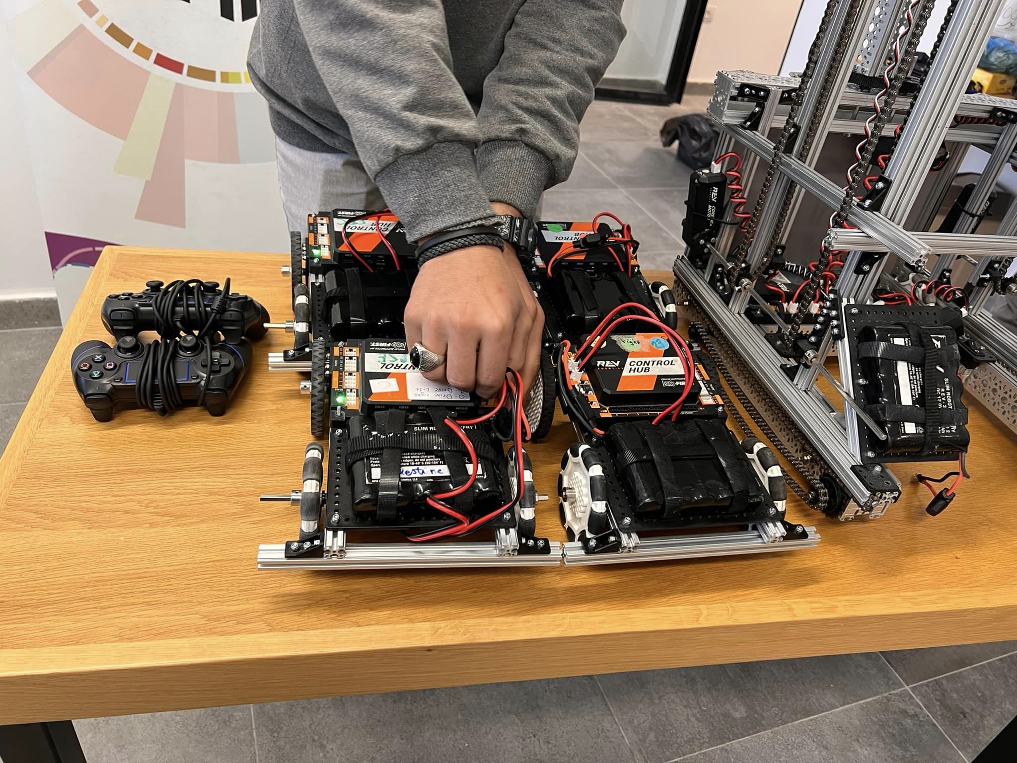 A robotics kit being assembled on a workbench in the labs